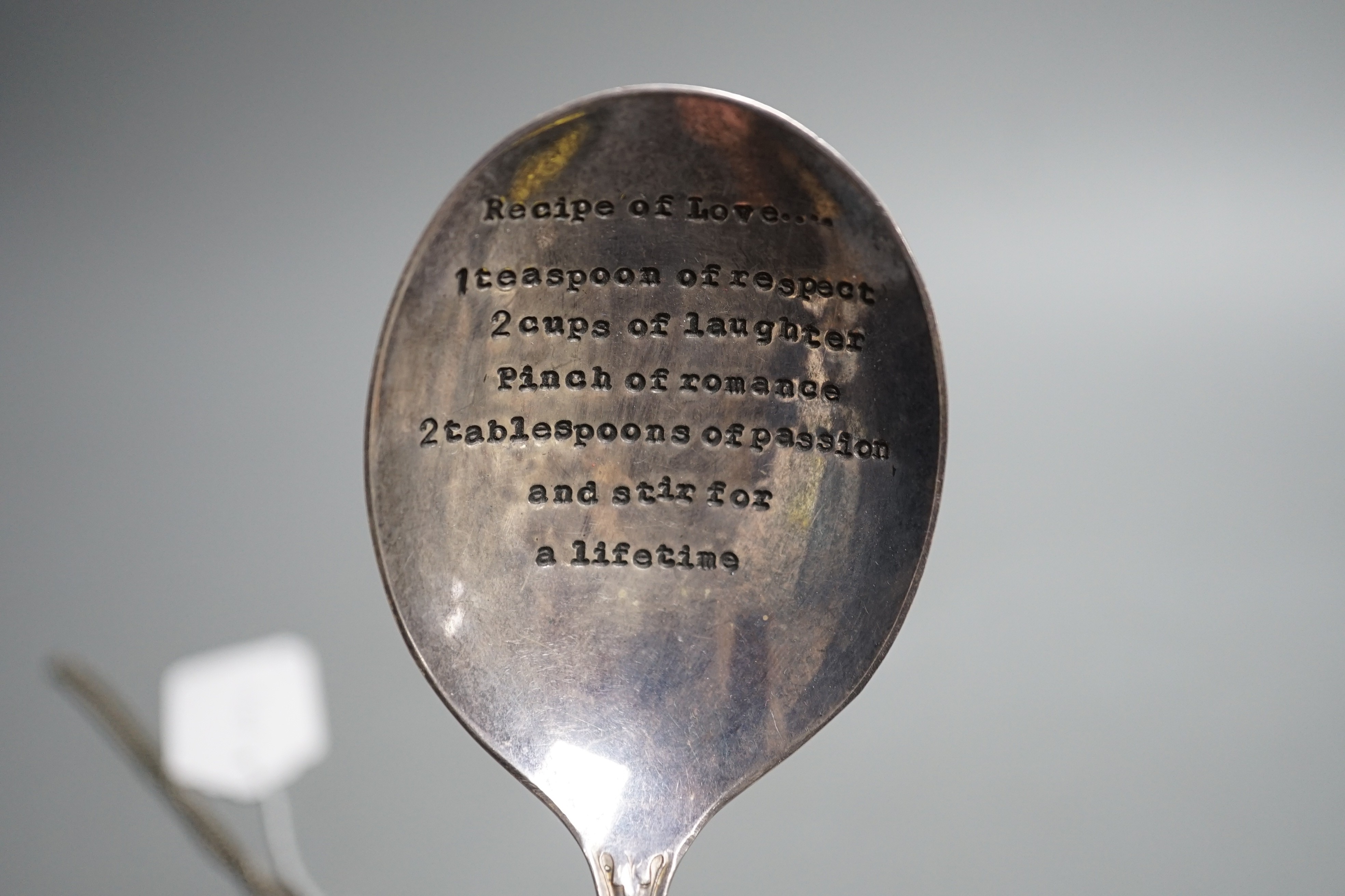 A Serkisof (Russian) pocket watch, two small silver items and a plated Recipe of Love spoon